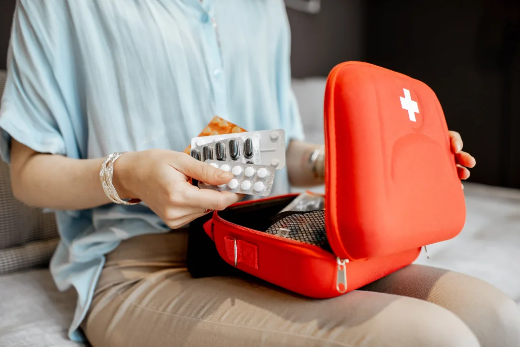 Person organizing pills before a trip