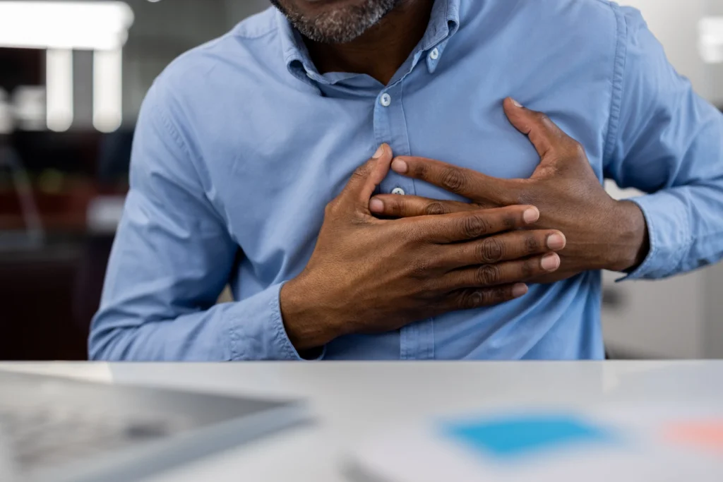 Person experiencing chest discomfort