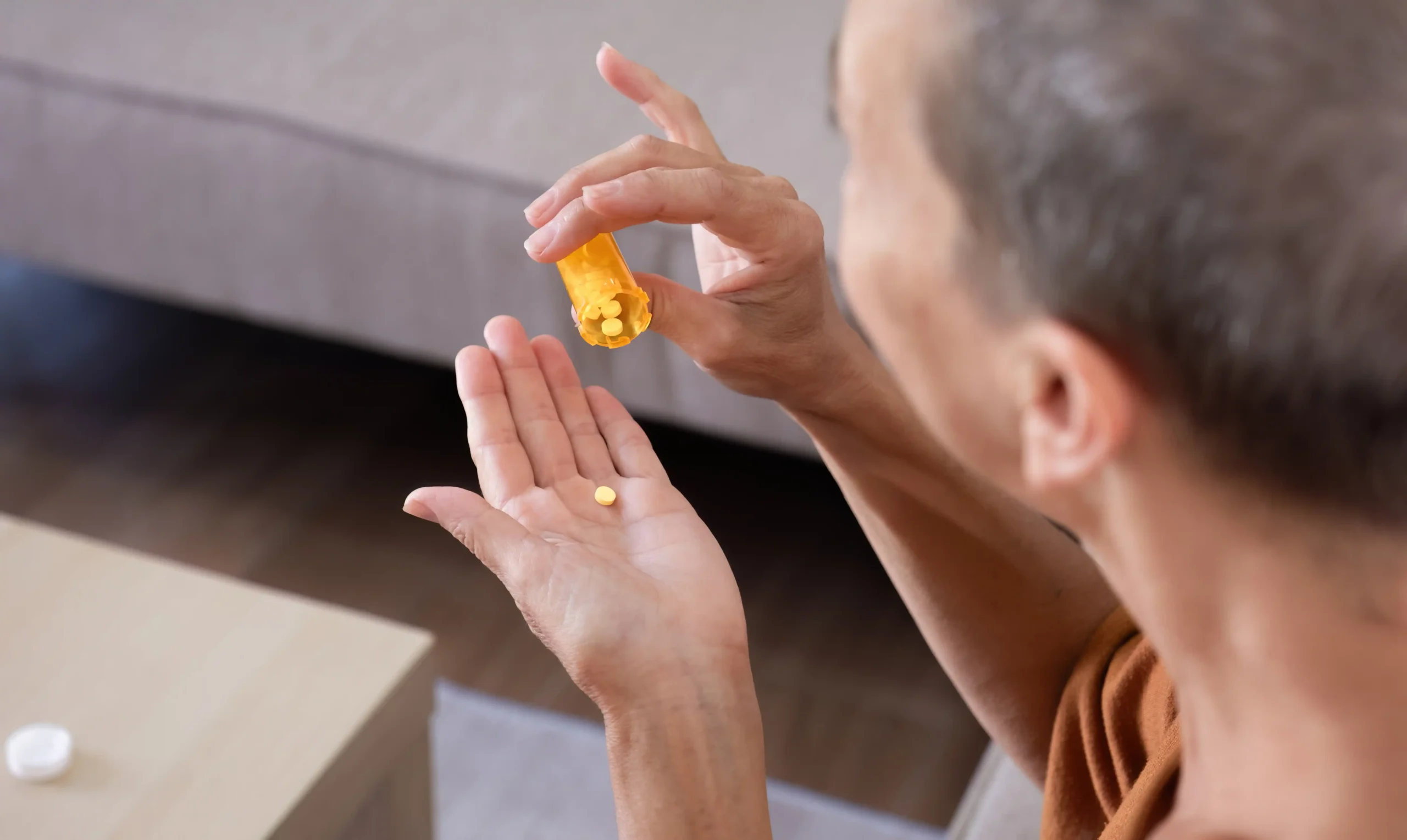 Senior person taking the missed dose of Metoprolol
